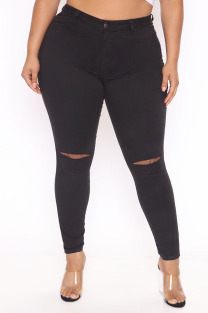 Skinny Jeans mit schmaler Taille - Schwarz